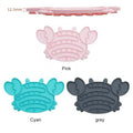 Dog Mat Food Bowls in pink, cyan, and grey silicone with crab-shaped design and raised slow feeding ridges