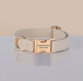PAWSOME DOG COLLAR in beige nylon webbing with rose gold metal buckle and D-ring, featuring PAWSOME PETS NEW YORK engraving.