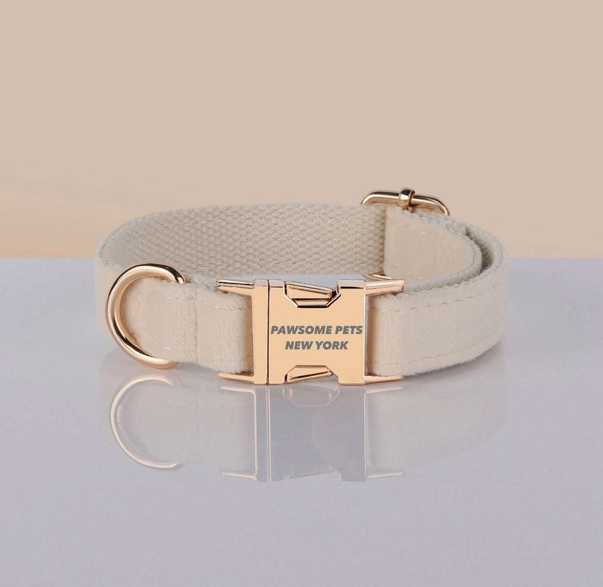 PAWSOME DOG COLLAR in beige nylon webbing with rose gold metal buckle and D-ring, featuring PAWSOME PETS NEW YORK engraving.