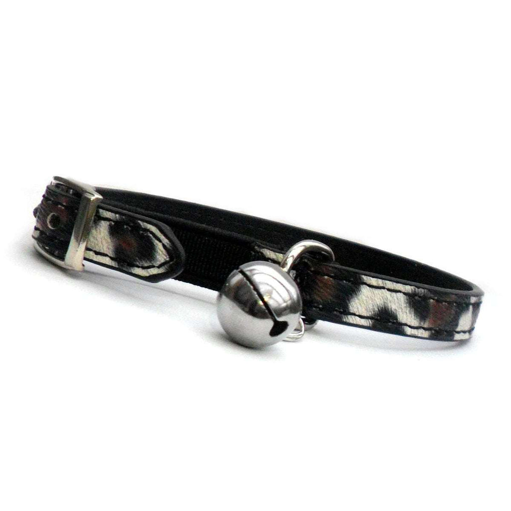 Leopard Print Cat Collar with black safety elastic, adjustable buckle holes, and silver bell with D-ring attachment.