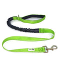 Bungee Dog Lead in bright green nylon with reflective stitching, neoprene padded handle, heavy-duty metal clip, and elastic shock-absorbing section.
