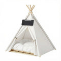 Pawz Pet Tent in white polyester fabric with pine wood poles, featuring a soft washable cushion and small triangular design.
