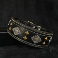 Black leather Aztec collar with soft padded interior, featuring antique silver and brass pyramid studs and decorative zipper trim.