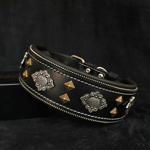 Black leather Aztec collar with soft padded interior, featuring antique silver and brass pyramid studs and decorative zipper trim.
